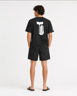 UVEA WHALE cotton t-shirt back view in studio, white whale-tail motif