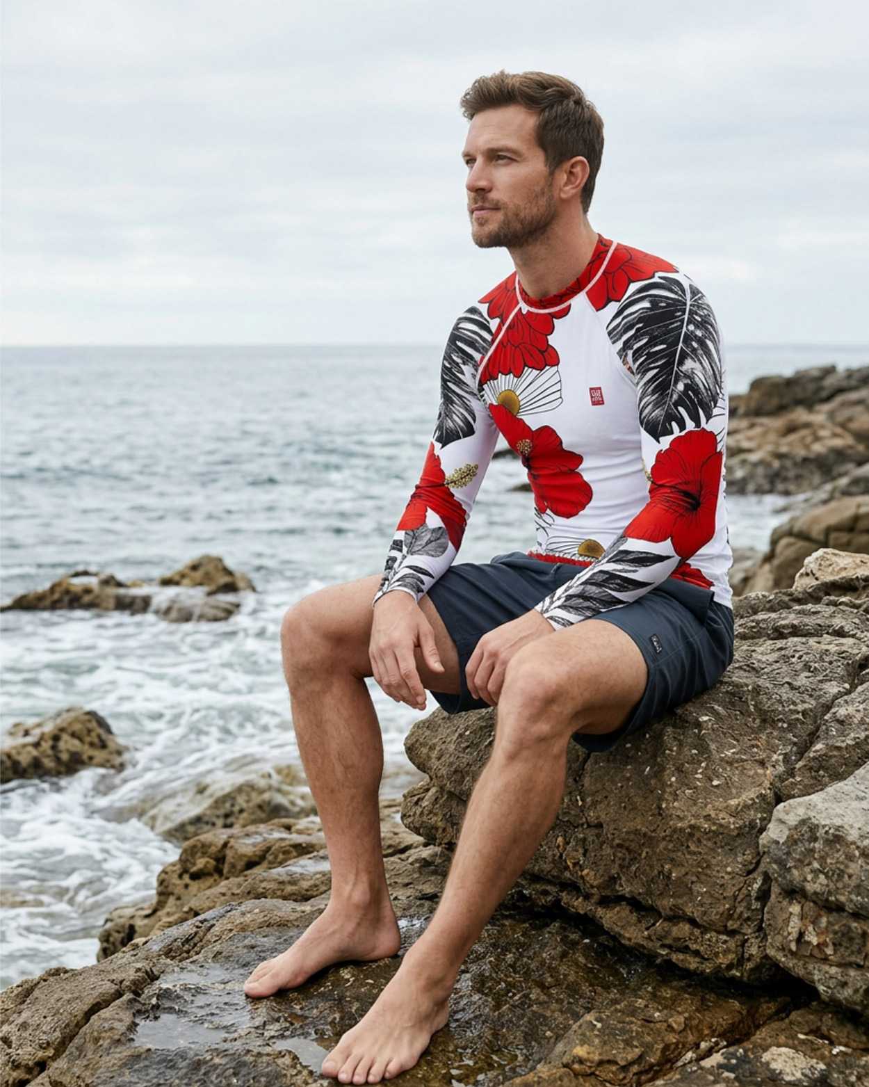 pecheur sur bateau en rashguard a capuche 